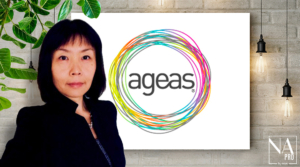 Portrait of Solia Luo in a suit with a background with the Ageas logo