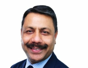 Portrait of Amit Garg in a suit